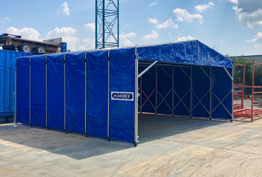 a blue tarp on a concrete surface