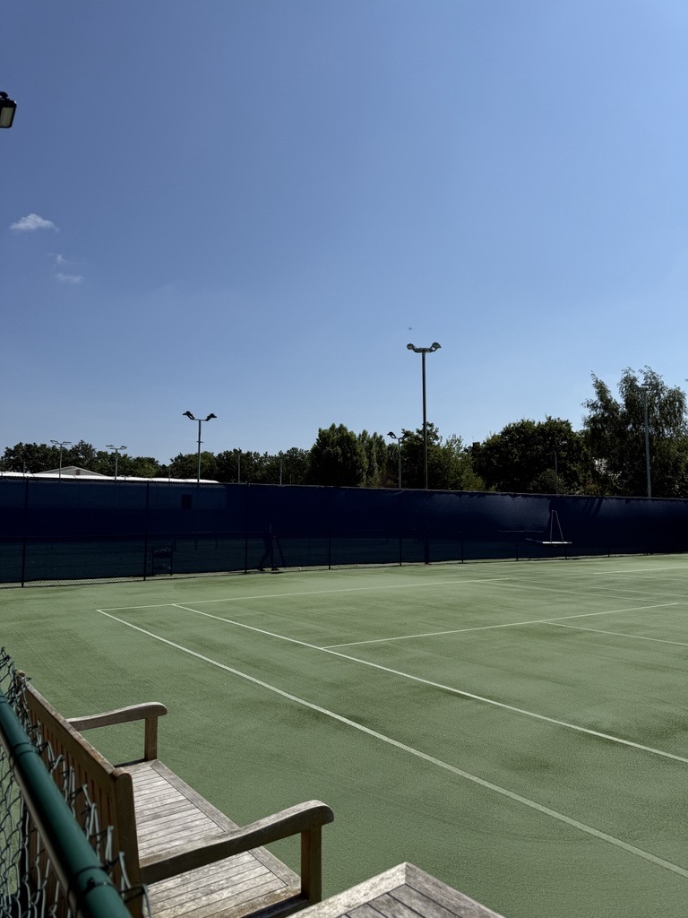 Completed outdoor court windbreak system