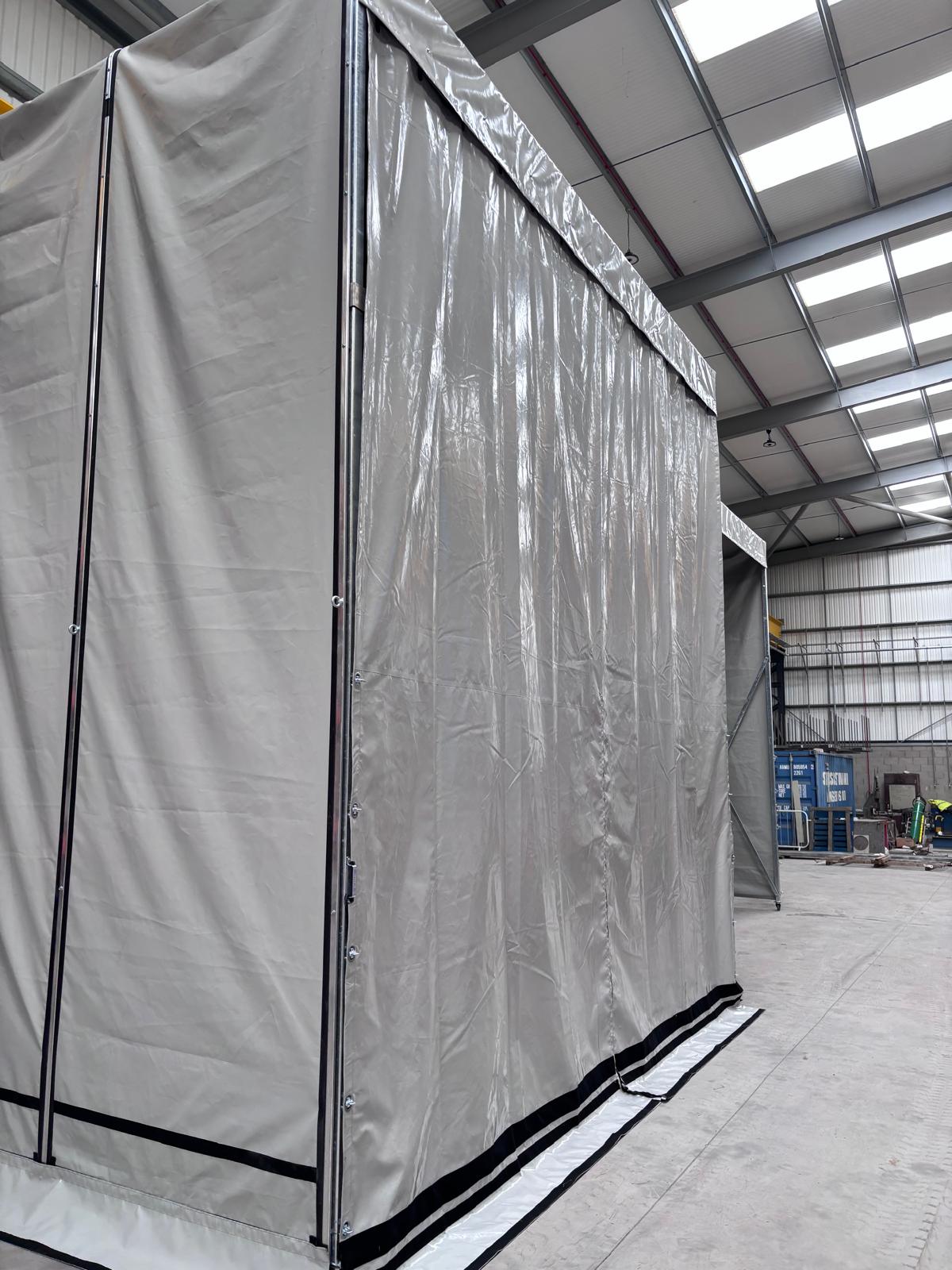 Internal retractable work enclosure