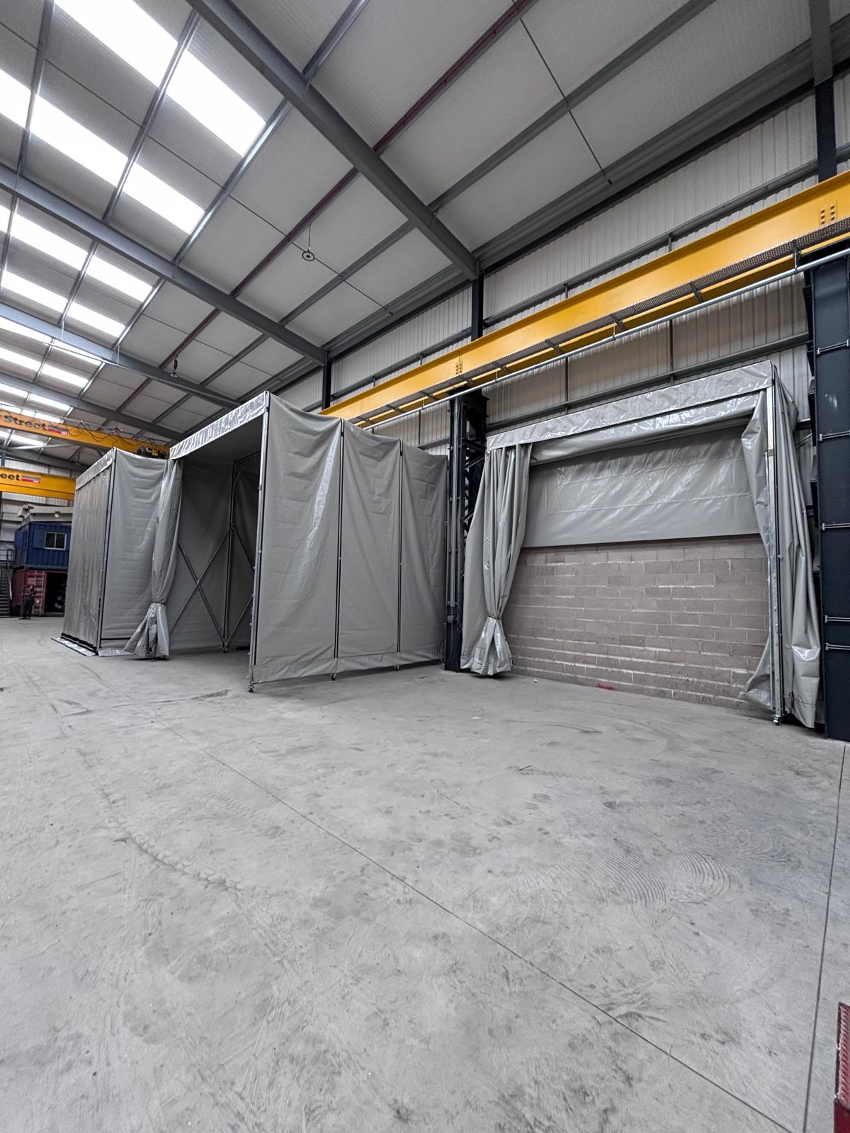 Internal retractable spray booth installed for Stainless Restoration