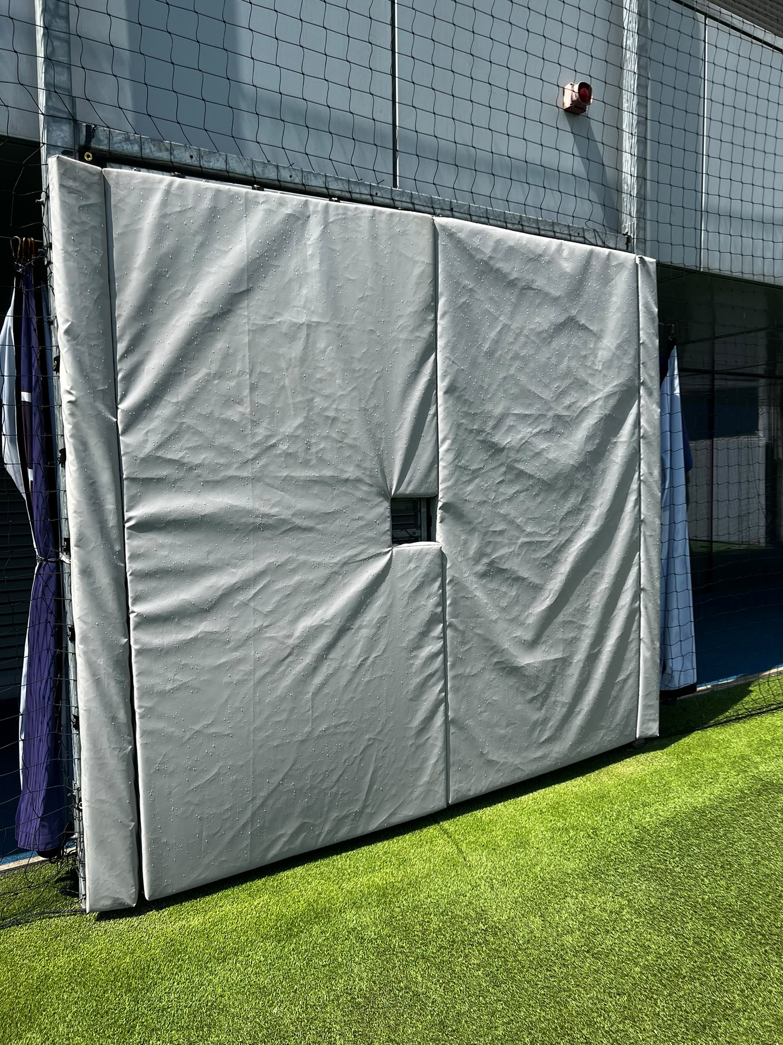 Removable protective padding manufactured around electrical equipment