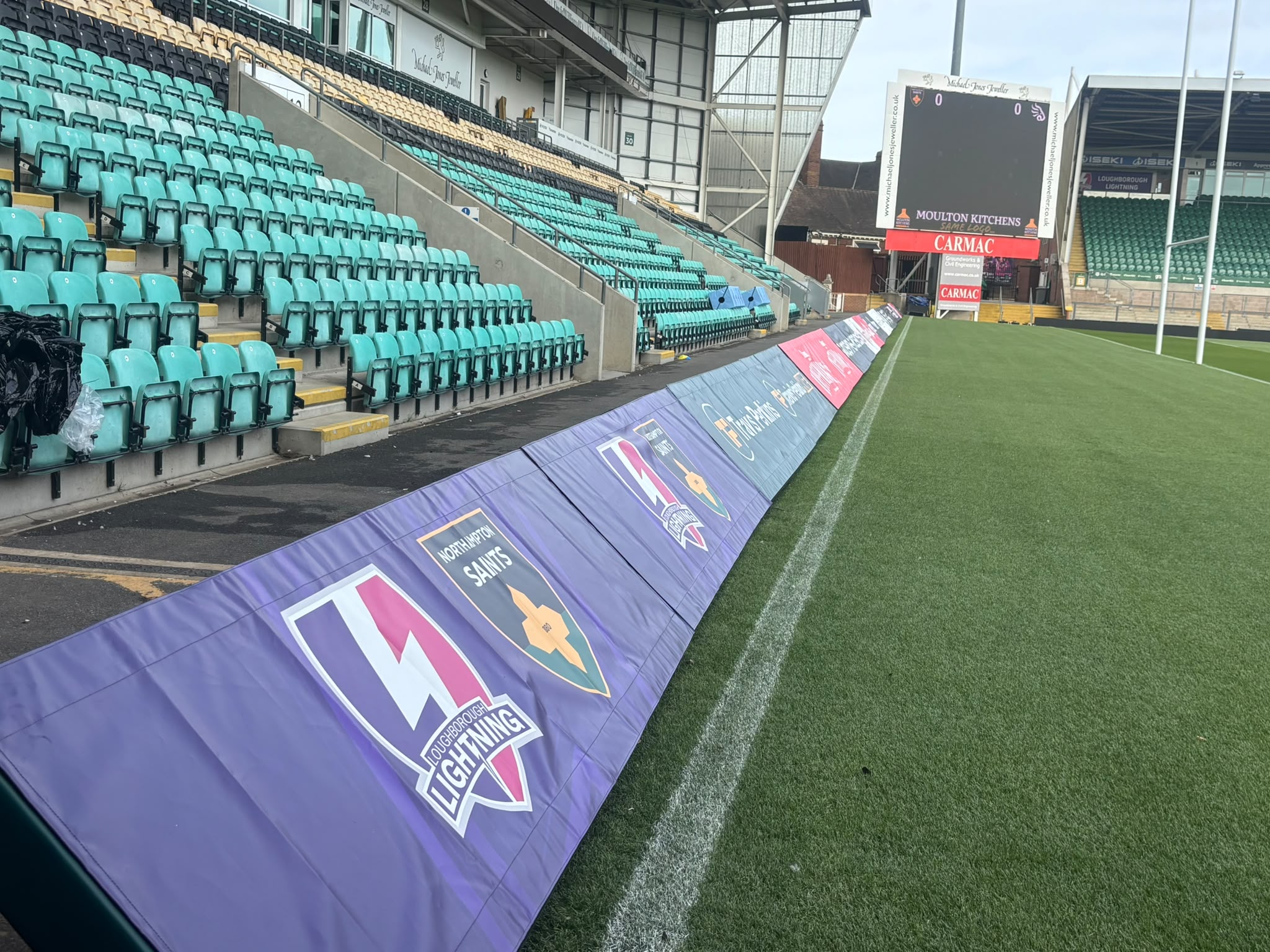 Sponsored tryline safety padding installed for Northampton Saints