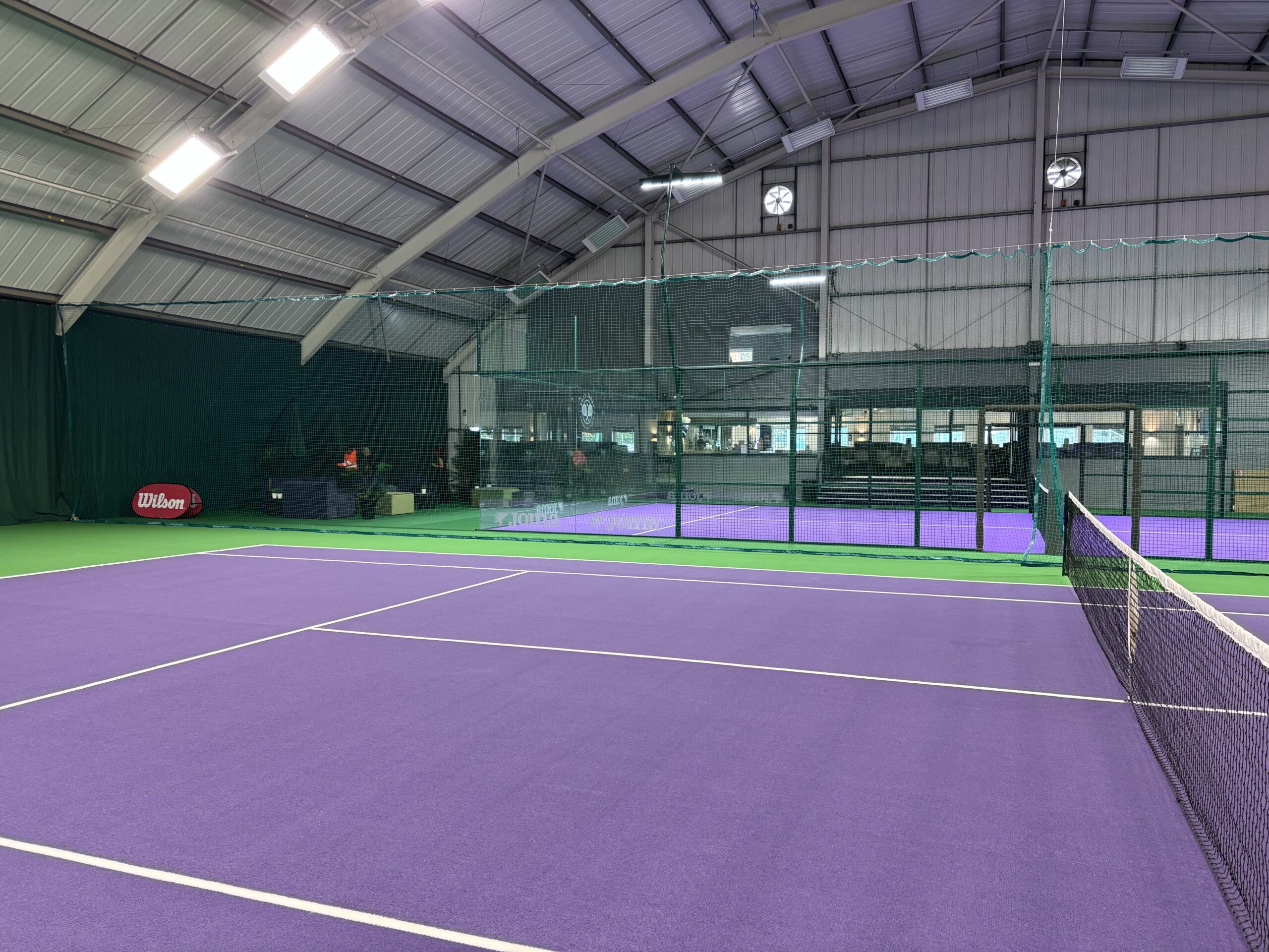Divider netting separating the padel and indoor tennis court areas at Tennis World Middlesbrough